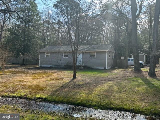 22473 Nanticoke Road Quantico, MD 21856 - Photo 2 of 8 a view of a backyard with a large tree