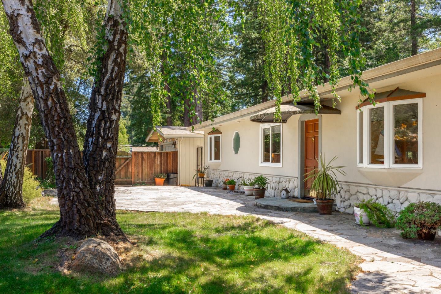 2000 Glen Canyon Road Santa Cruz, CA 95060 - Photo 1 of 41 a backyard of a house with yard and outdoor seating