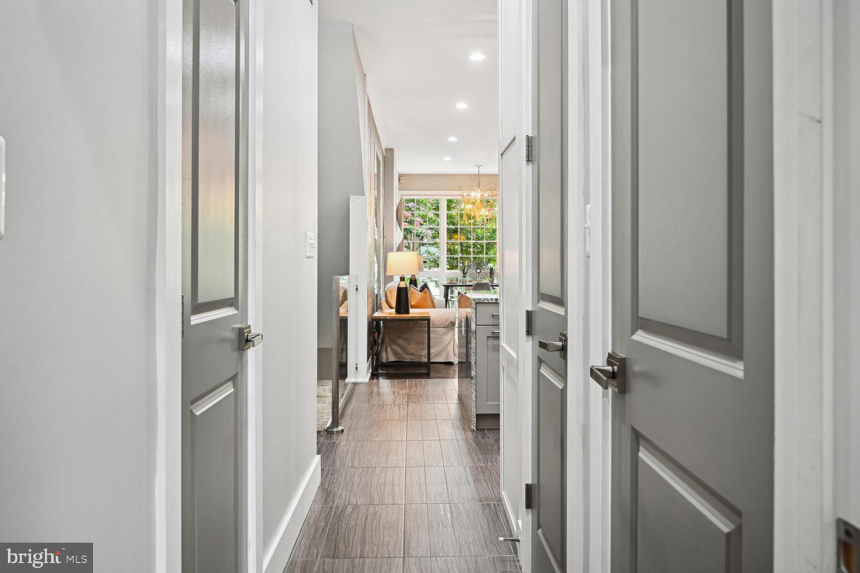 1143 5th Street Northeast, Unit 1 Washington, DC 20002 - Photo 15 of 54 a en suite bathroom with a sink and a mirror