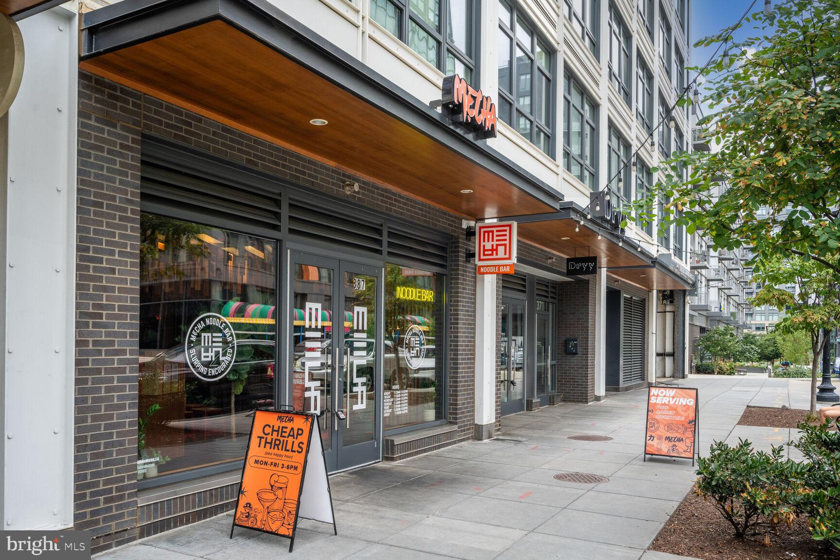 1143 5th Street Northeast, Unit 1 Washington, DC 20002 - Photo 49 of 54 a bench is sitting in front of a building