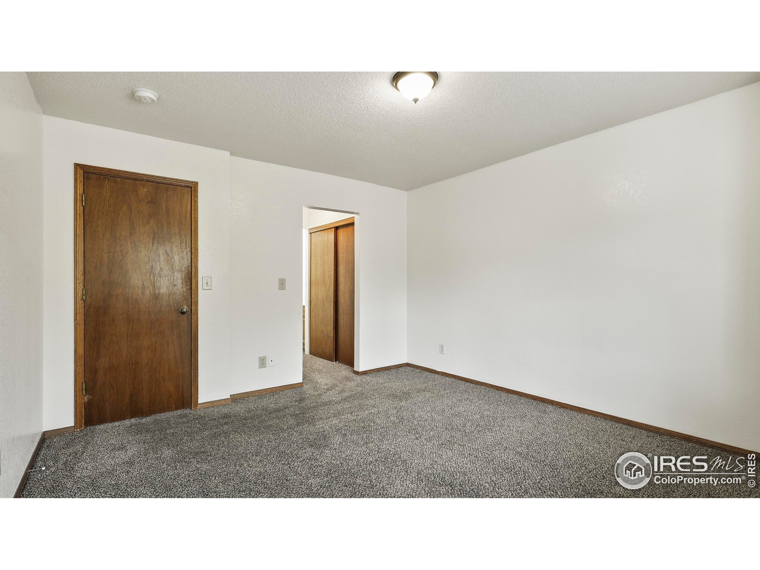 5809 West 18th Street Greeley, CO 80634 - Photo 17 of 25 a black and white photo of a room