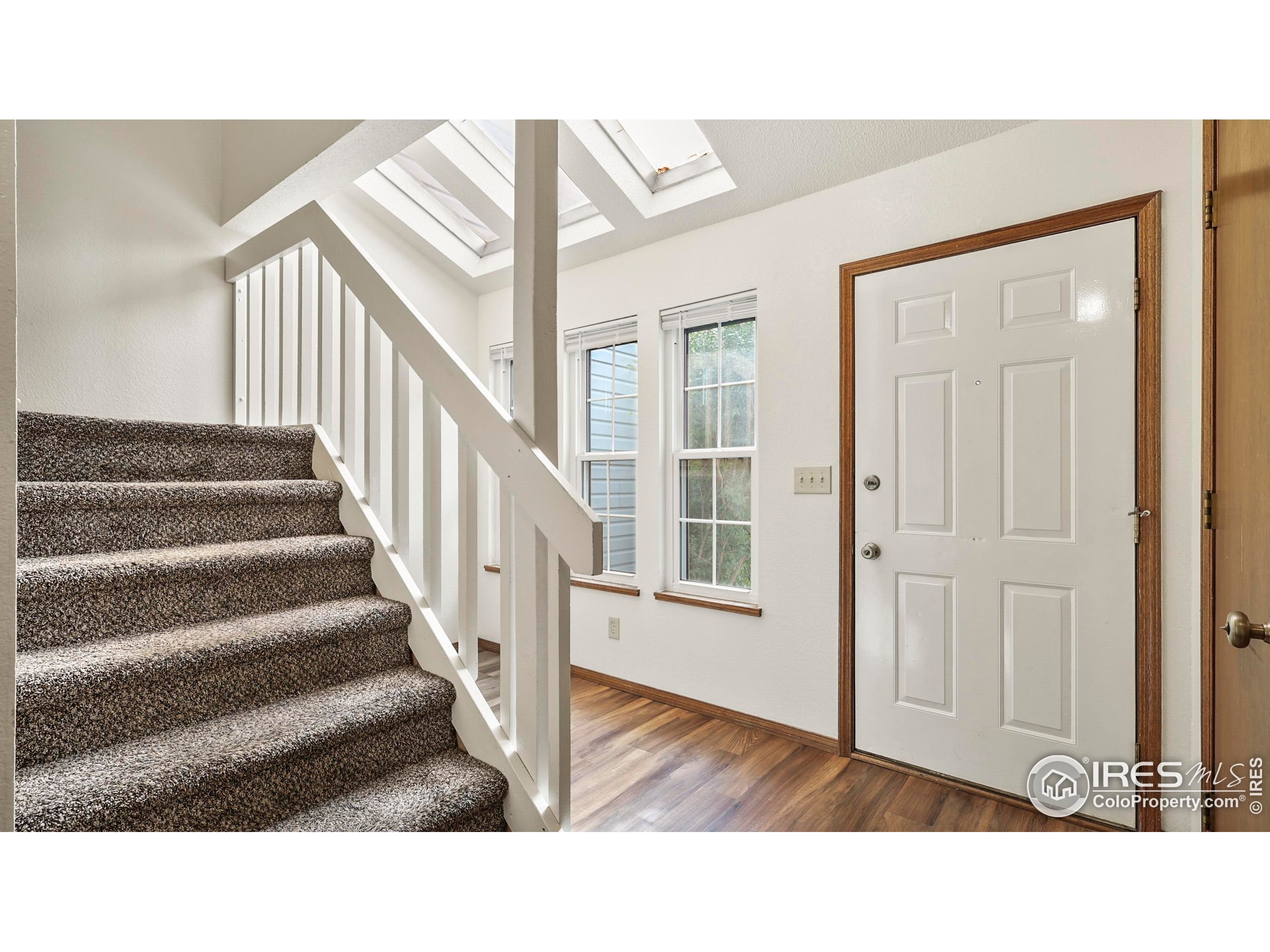 5809 West 18th Street Greeley, CO 80634 - Photo 9 of 25 a black and white photo of a living room
