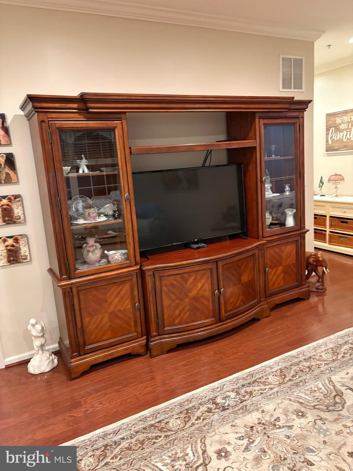 524 Highland Estates Clementon, NJ 08021 - Photo 20 of 22 a living room with a flat screen tv and cabinets