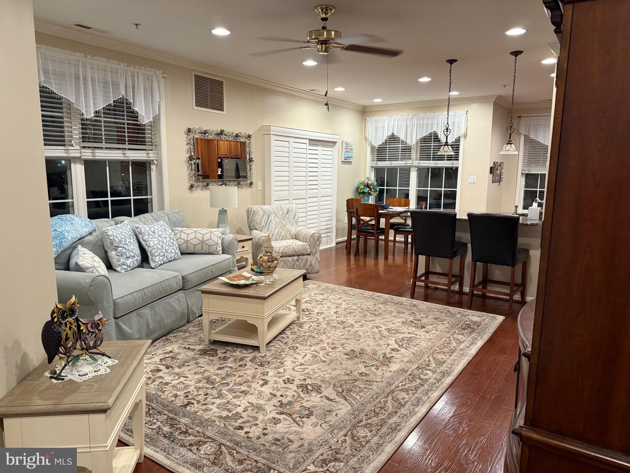 524 Highland Estates Clementon, NJ 08021 - Photo 4 of 22 a living room with furniture wooden floor and kitchen view