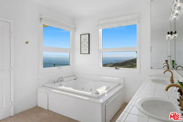 a view of balcony with furniture