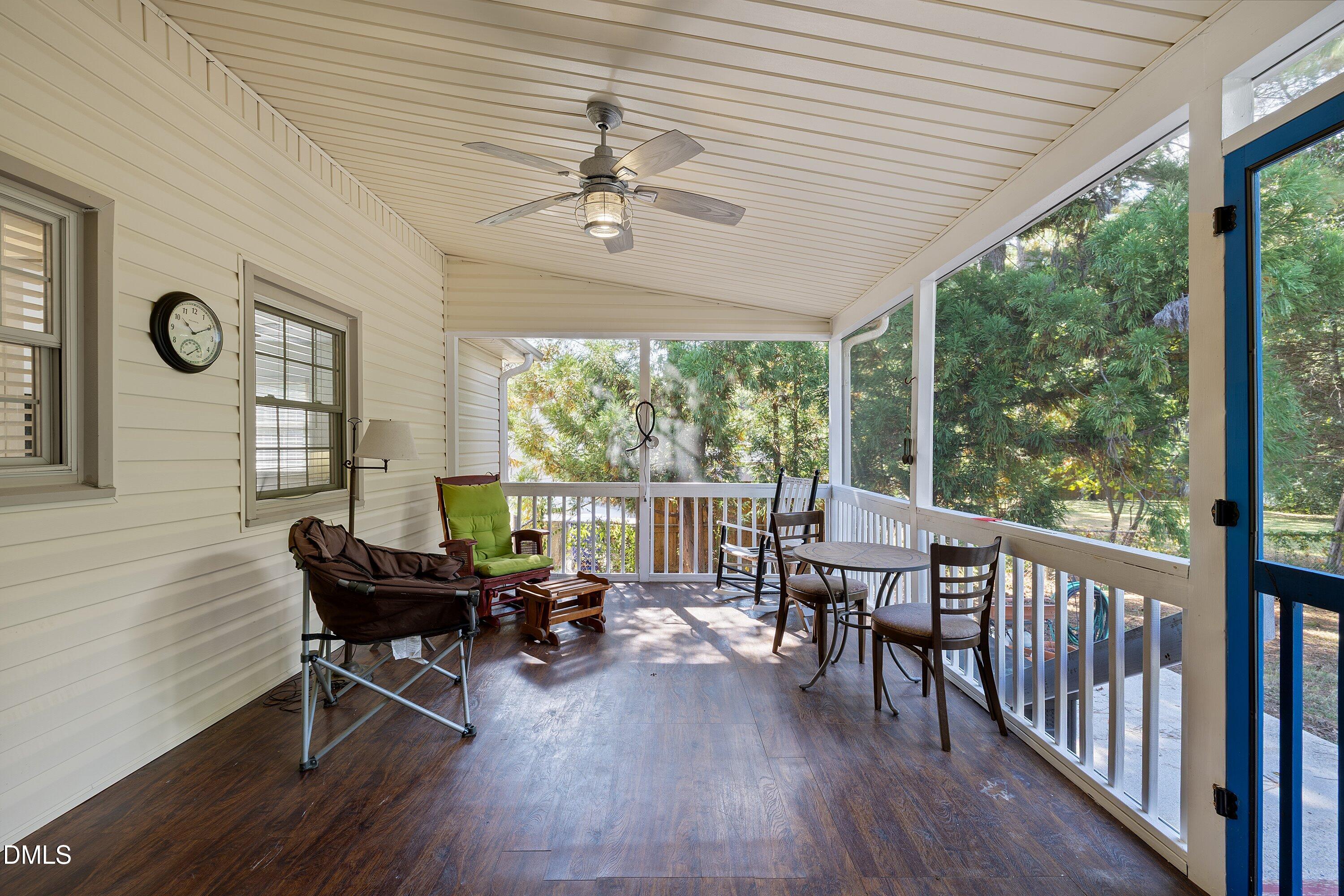 1445 Sedwick Road Durham, NC 27713 - Photo 29 of 48 a living room with furniture and a large window
