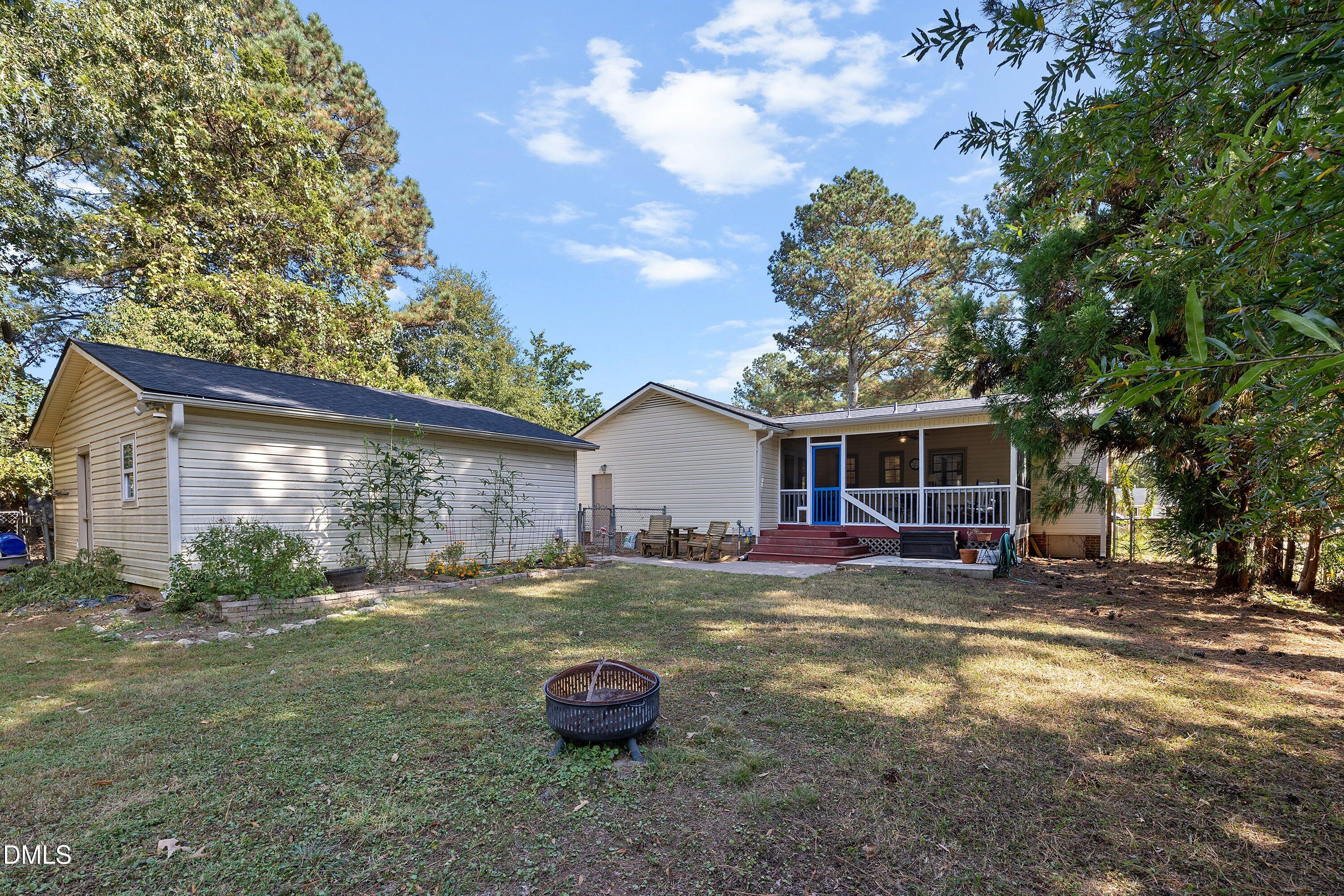 1445 Sedwick Road Durham, NC 27713 - Photo 34 of 48 a view of a small yard in front of a house