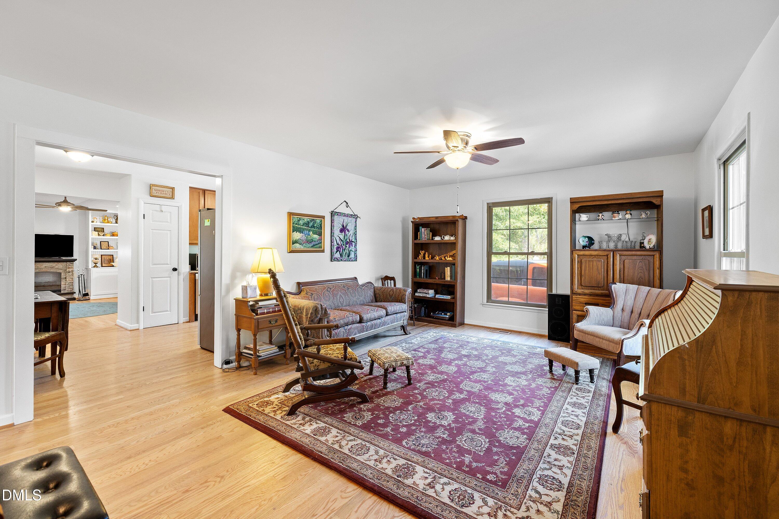 1445 Sedwick Road Durham, NC 27713 - Photo 5 of 48 a living room with furniture rug and window