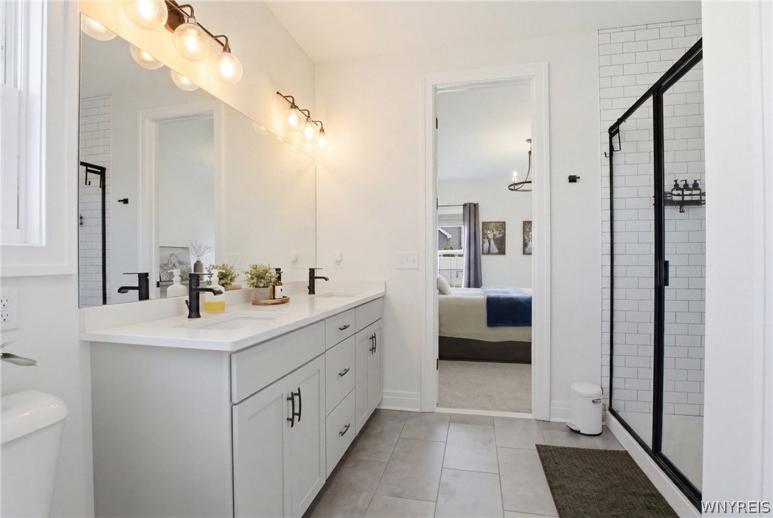 5561 Cooper Ridge Hamburg, NY 14075 - Photo 15 of 50 Primary bedroom ensuite bathroom on the first floo