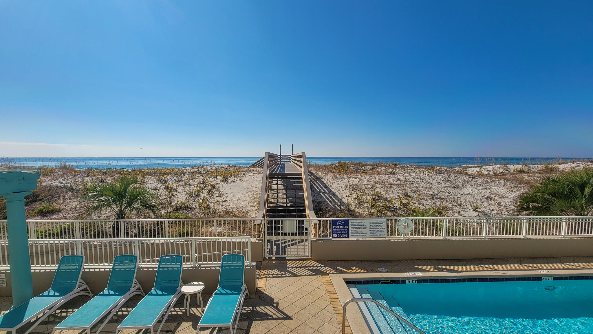 376 Santa Rosa Boulevard, Unit 115 Fort Walton Beach, FL 32548 - Photo 11 of 37 a view of a balcony next to a lake