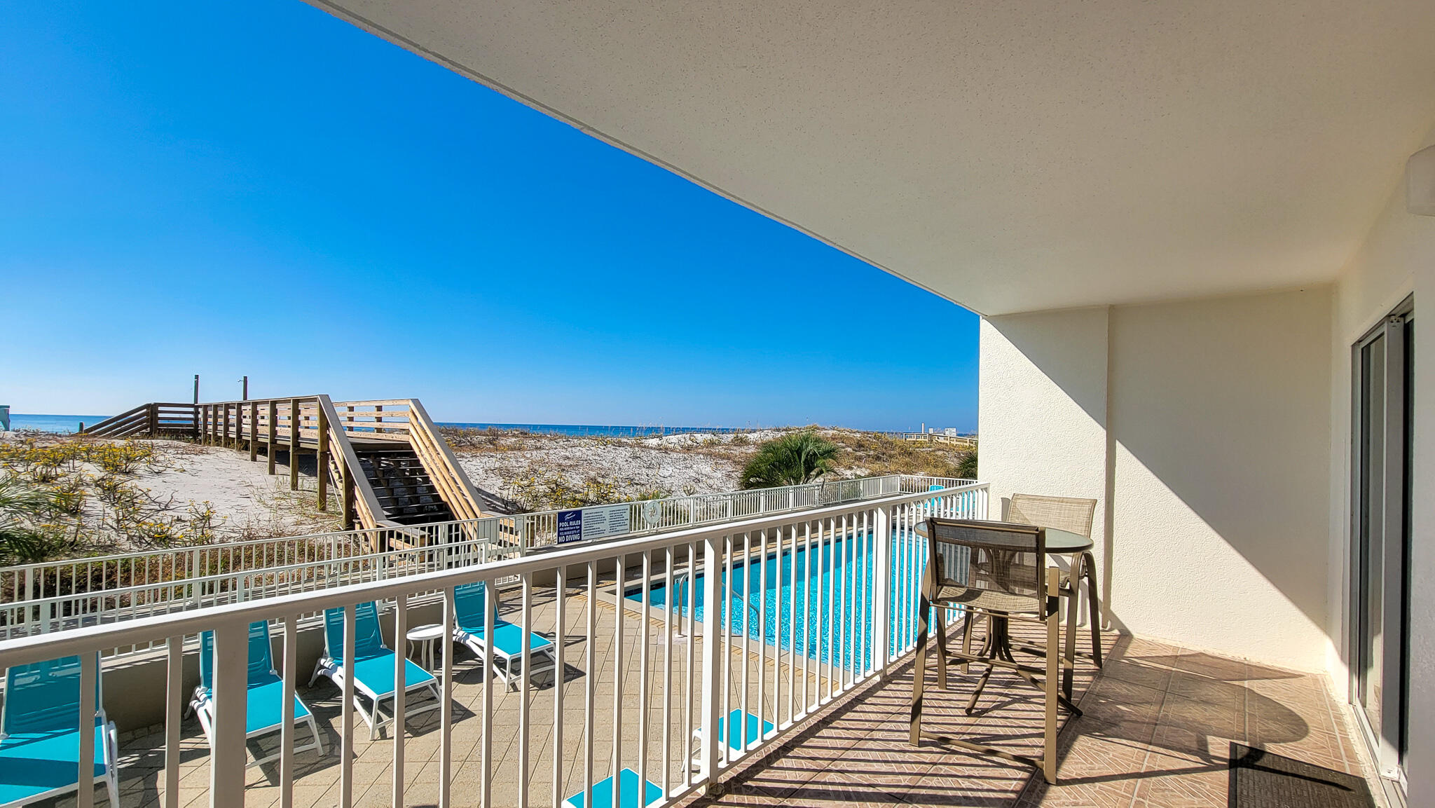 376 Santa Rosa Boulevard, Unit 115 Fort Walton Beach, FL 32548 - Photo 12 of 37 a view of a balcony with staircase