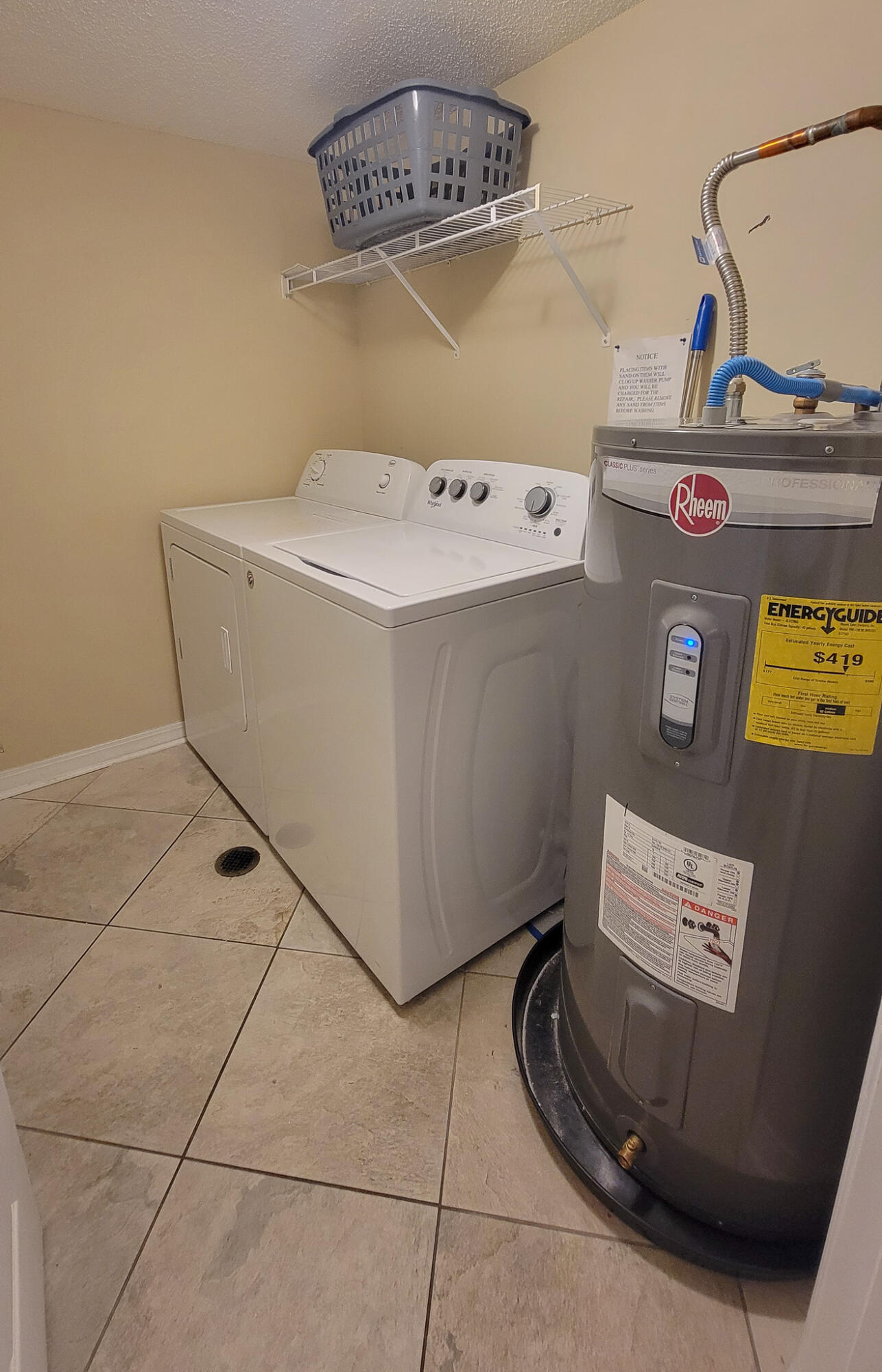 376 Santa Rosa Boulevard, Unit 115 Fort Walton Beach, FL 32548 - Photo 19 of 37 a utility room with washer and dryer
