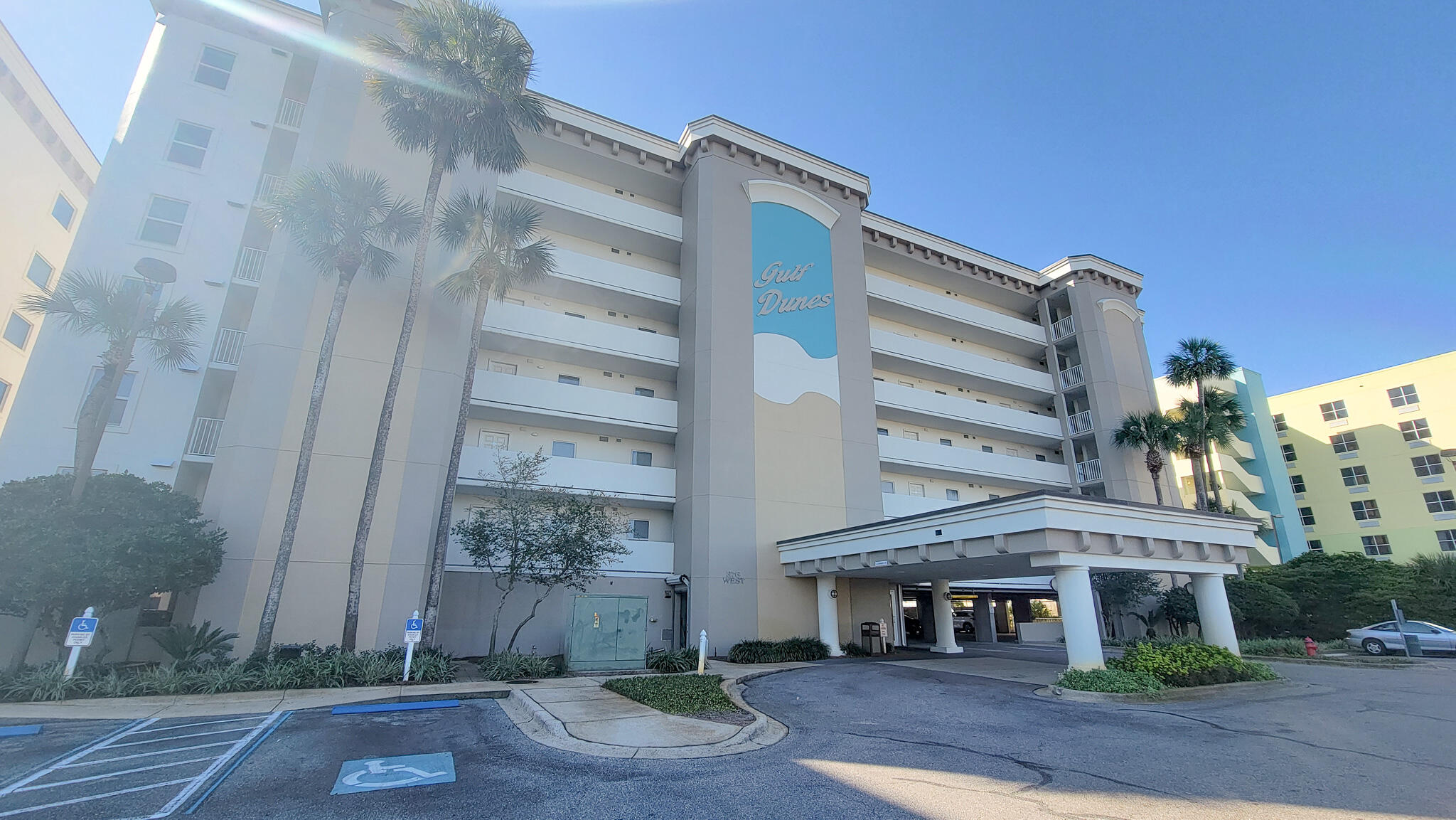 376 Santa Rosa Boulevard, Unit 115 Fort Walton Beach, FL 32548 - Photo 32 of 37 a front view of a building with garden