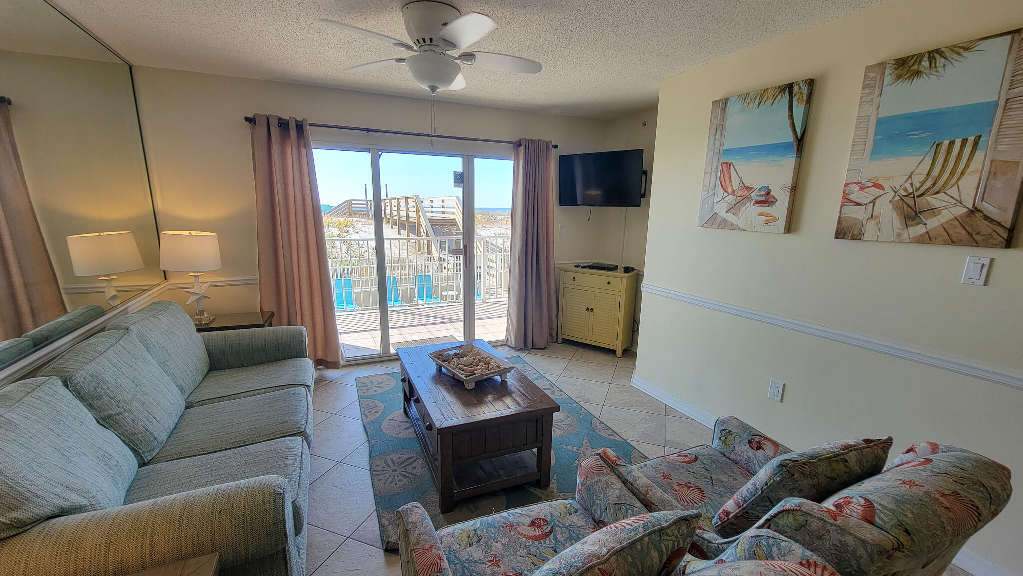 376 Santa Rosa Boulevard, Unit 115 Fort Walton Beach, FL 32548 - Photo 8 of 37 a living room with furniture and a large window