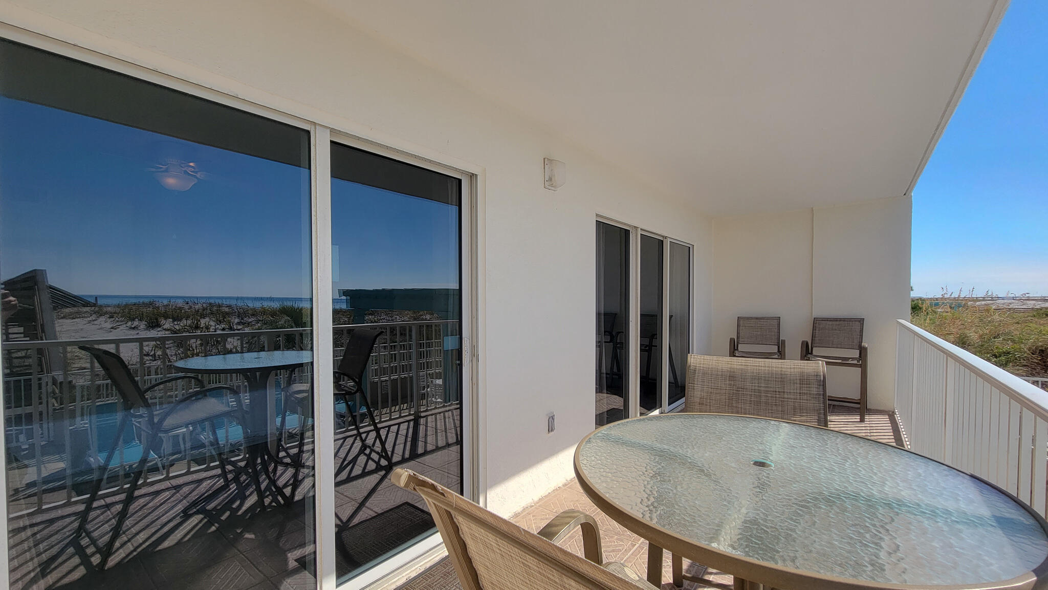 376 Santa Rosa Boulevard, Unit 115 Fort Walton Beach, FL 32548 - Photo 9 of 37 a dining room with furniture