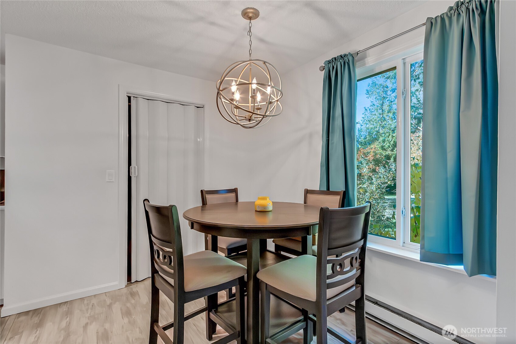 419 South 325th Place, Unit T7 Federal Way, WA 98003 - Photo 4 of 16 a view of a dining room with furniture window and outside view