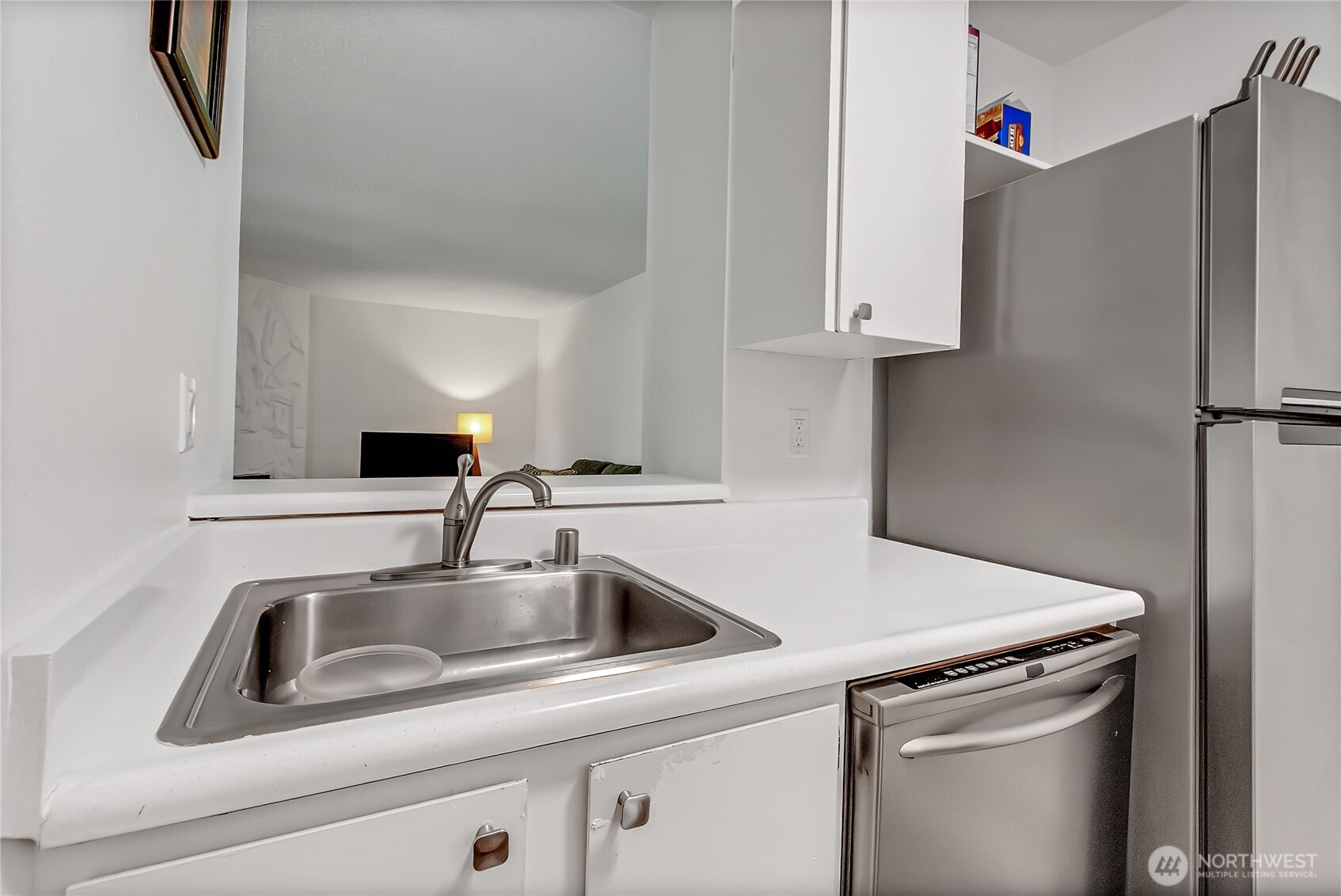 419 South 325th Place, Unit T7 Federal Way, WA 98003 - Photo 6 of 16 a close view of sink and tap