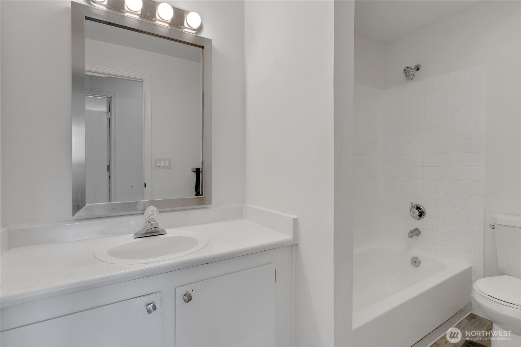 419 South 325th Place, Unit T7 Federal Way, WA 98003 - Photo 9 of 16 a bathroom with a sink a toilet and shower