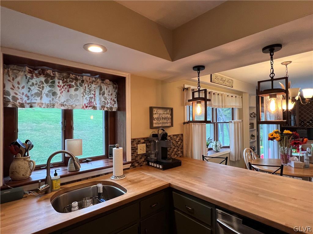 2753 Buttermilk Road Hellertown, PA 18055 - Photo 11 of 42 a kitchen that has a sink stove and cabinets