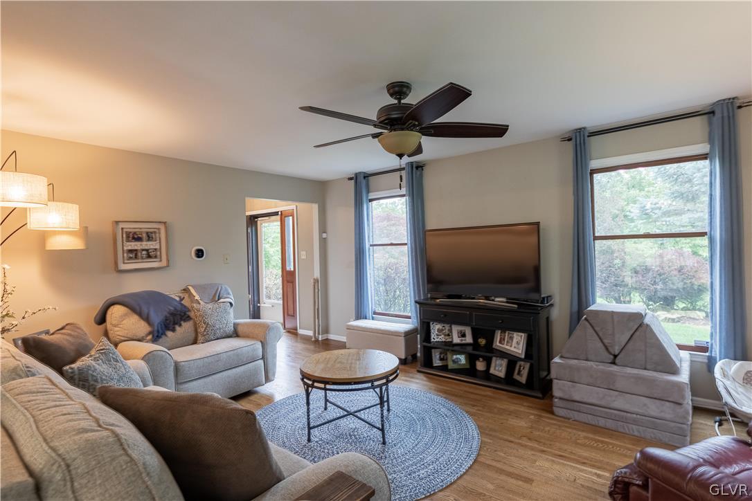2753 Buttermilk Road Hellertown, PA 18055 - Photo 19 of 42 a living room with furniture and a flat screen tv