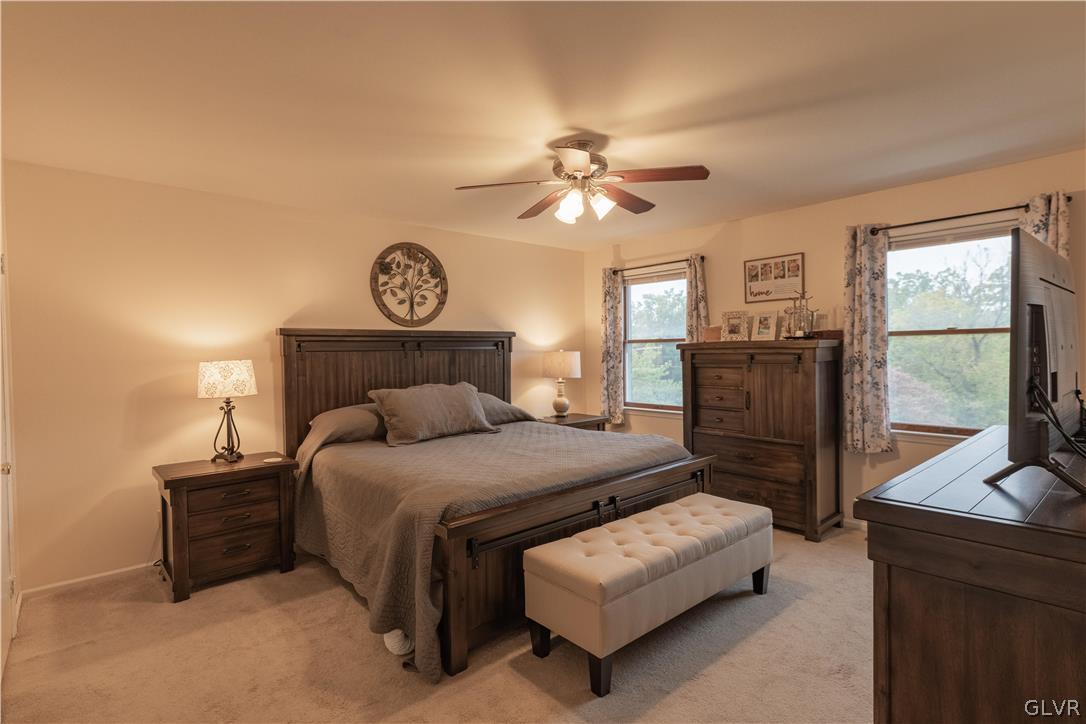 2753 Buttermilk Road Hellertown, PA 18055 - Photo 25 of 42 a bedroom with a bed mirror and window