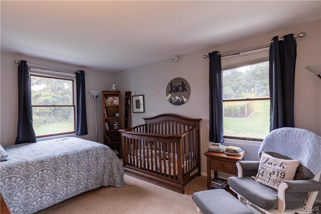 2753 Buttermilk Road Hellertown, PA 18055 - Photo 29 of 42 a bedroom with a bed and a window