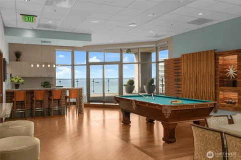 a room with furniture and wooden floor