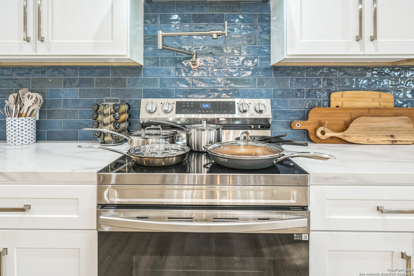 6789 River New Braunfels, TX 78132 - Photo 11 of 50 a kitchen with a stove and cabinets