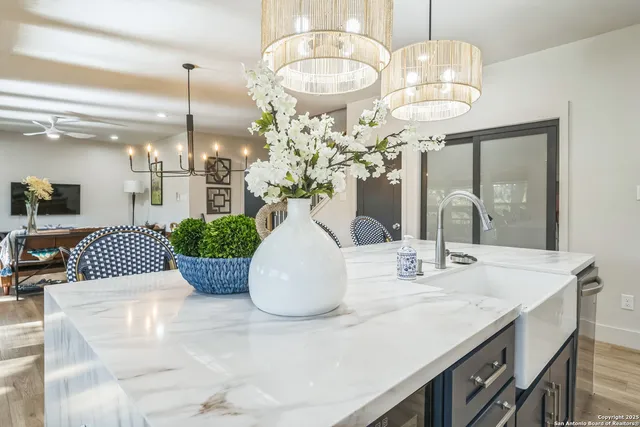 a view of dining room and chandelier