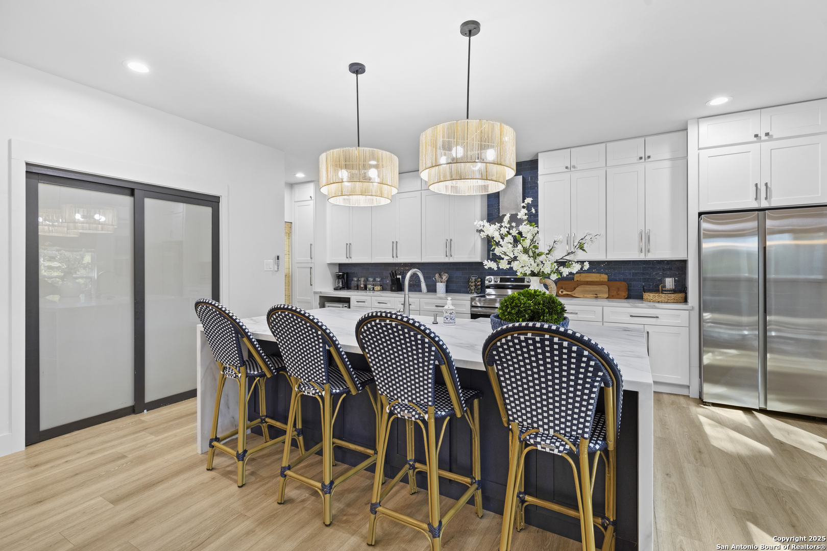 6789 River New Braunfels, TX 78132 - Photo 17 of 50 a view of kitchen and dining room with wooden floor