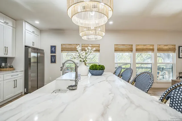 a bed room with a bed and a large mirror