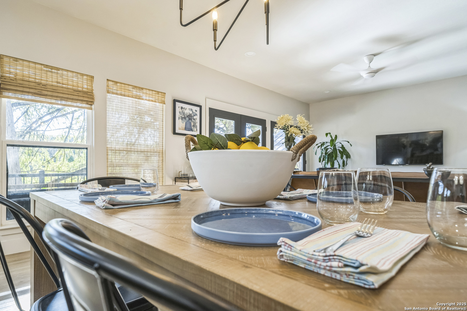 6789 River New Braunfels, TX 78132 - Photo 27 of 50 a living room with furniture and a flat screen tv