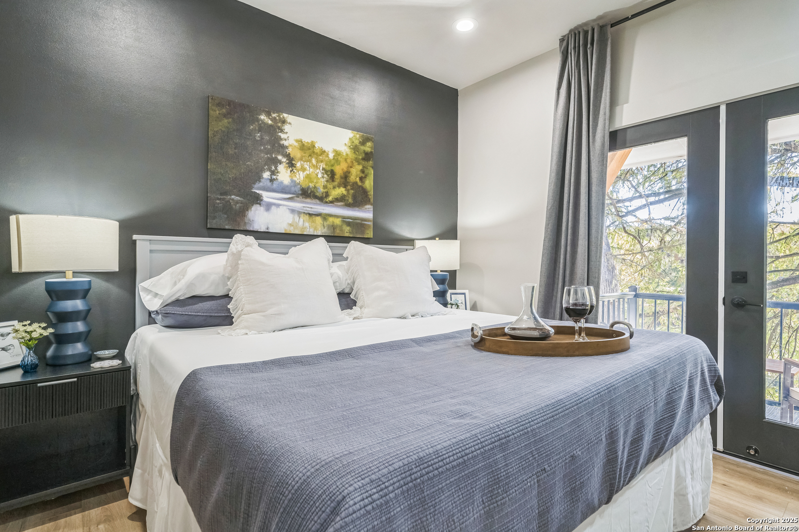 6789 River New Braunfels, TX 78132 - Photo 31 of 50 a bedroom with a bed and a window