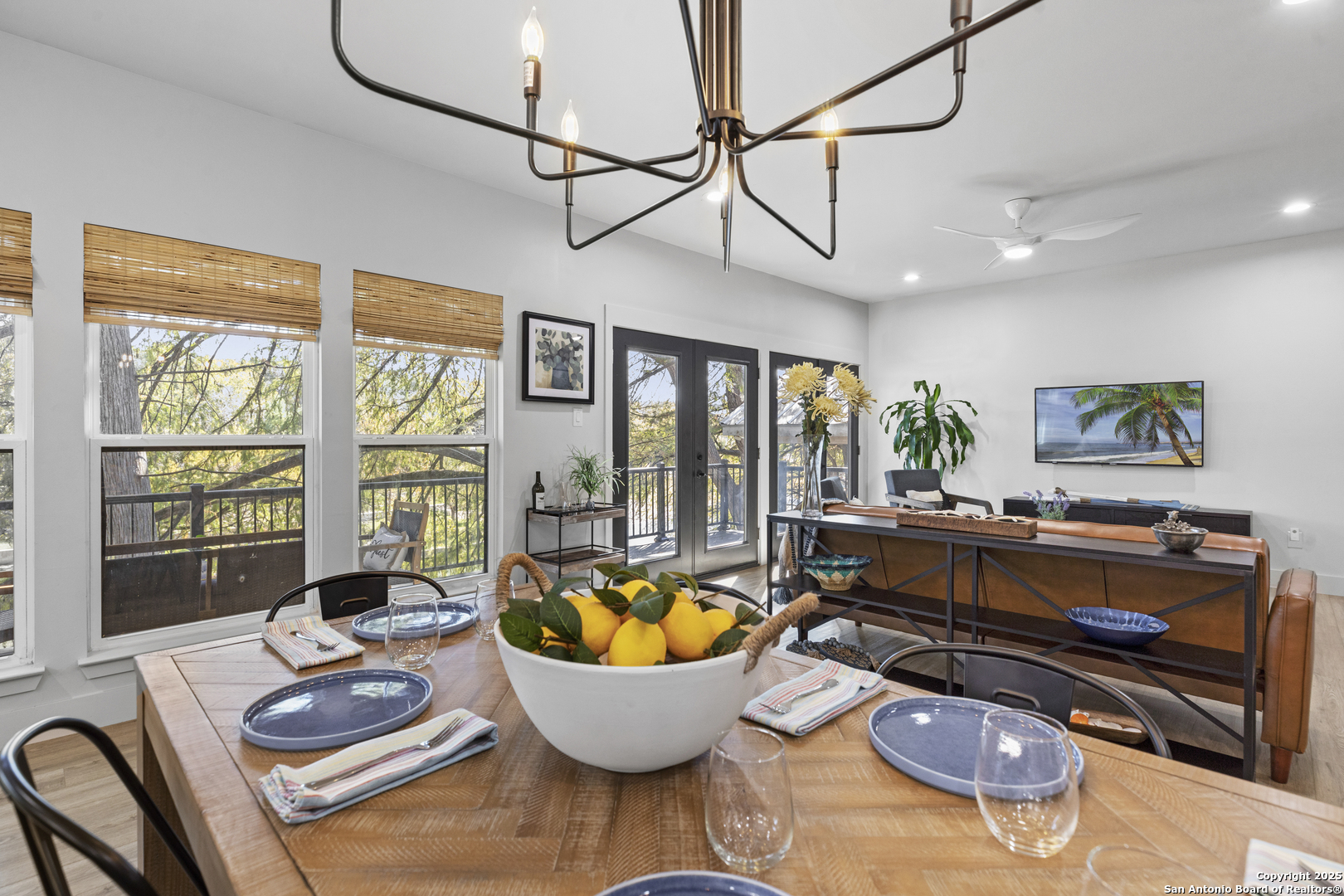 6789 River New Braunfels, TX 78132 - Photo 4 of 50 a living room with furniture and a floor to ceiling window