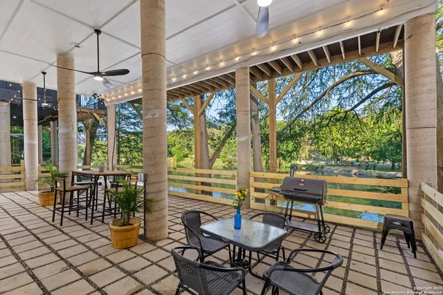 a outdoor space with lots of furniture and garden view