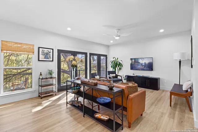 a bed room with furniture and a window