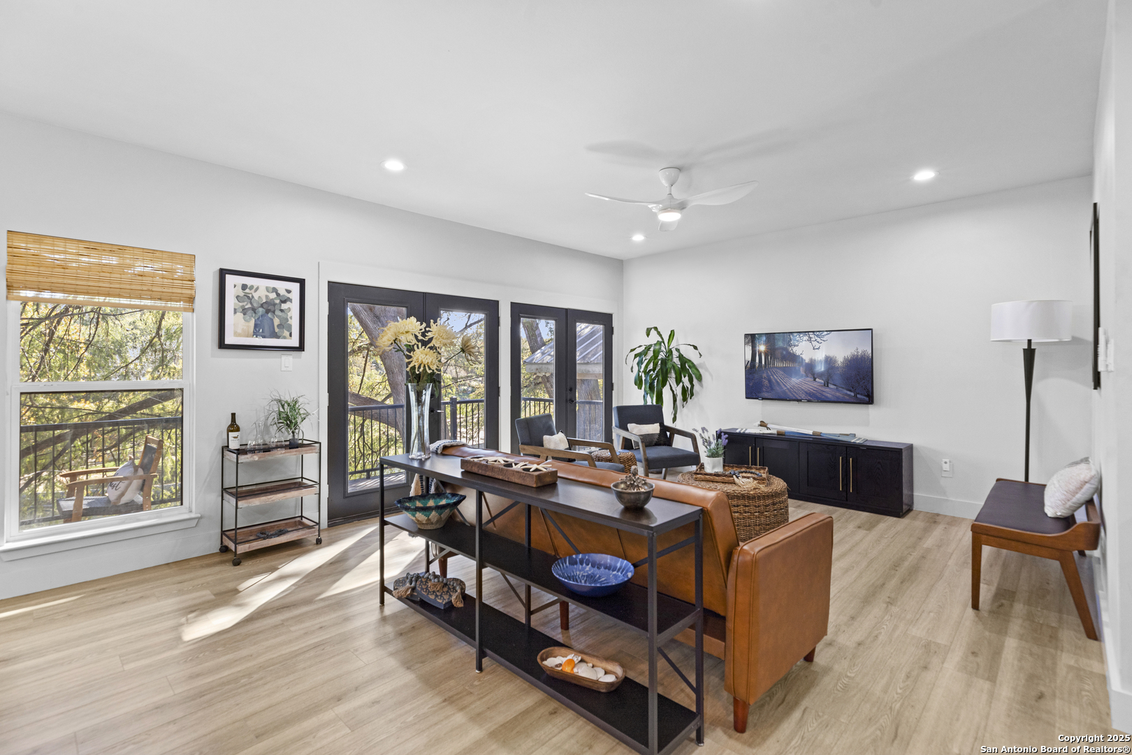 6789 River New Braunfels, TX 78132 - Photo 6 of 50 a bed room with furniture and a window
