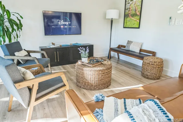 a living room with furniture and a couch