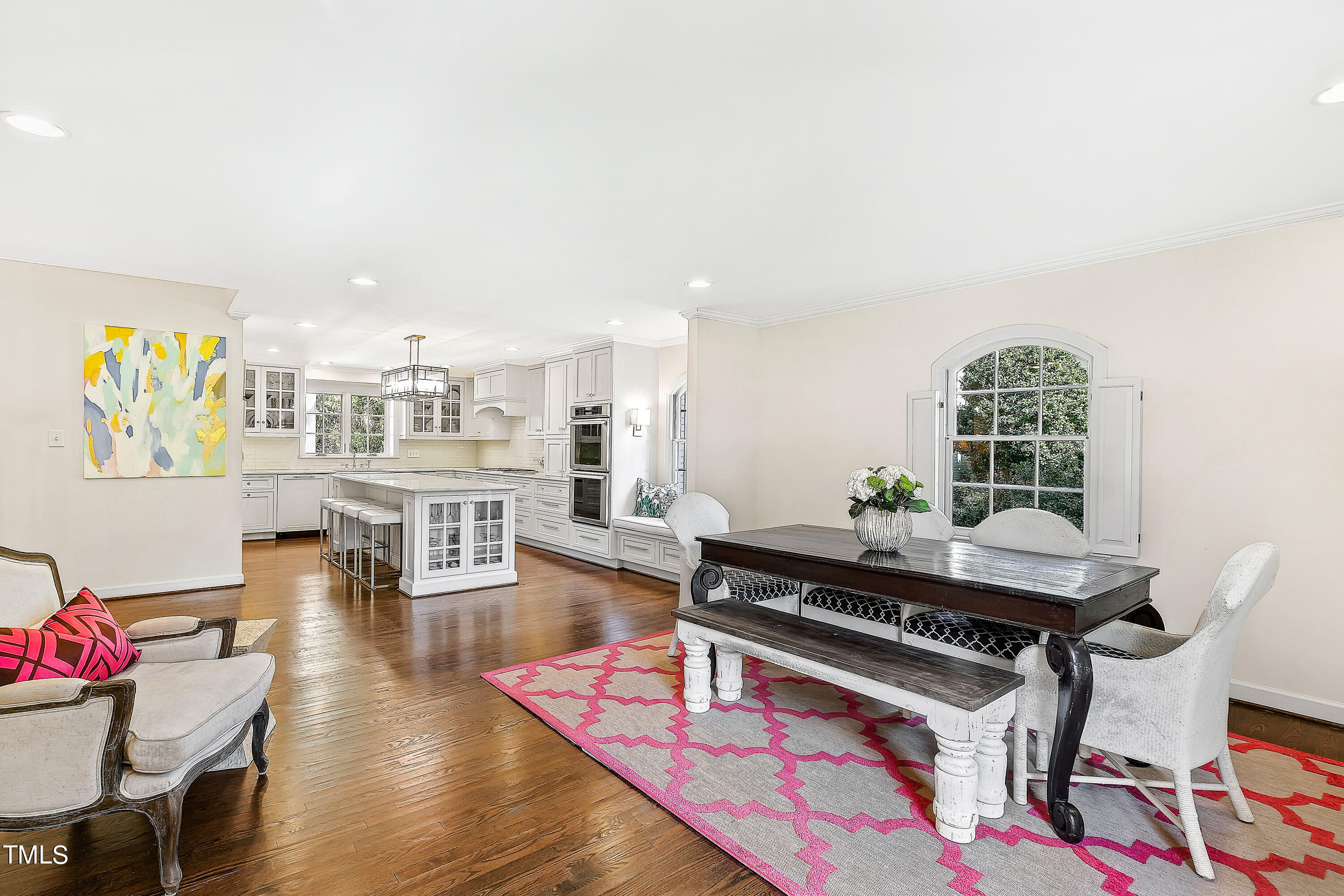 2618 Churchill Road Raleigh, NC 27608 - Photo 12 of 58 a living room with furniture and wooden floor