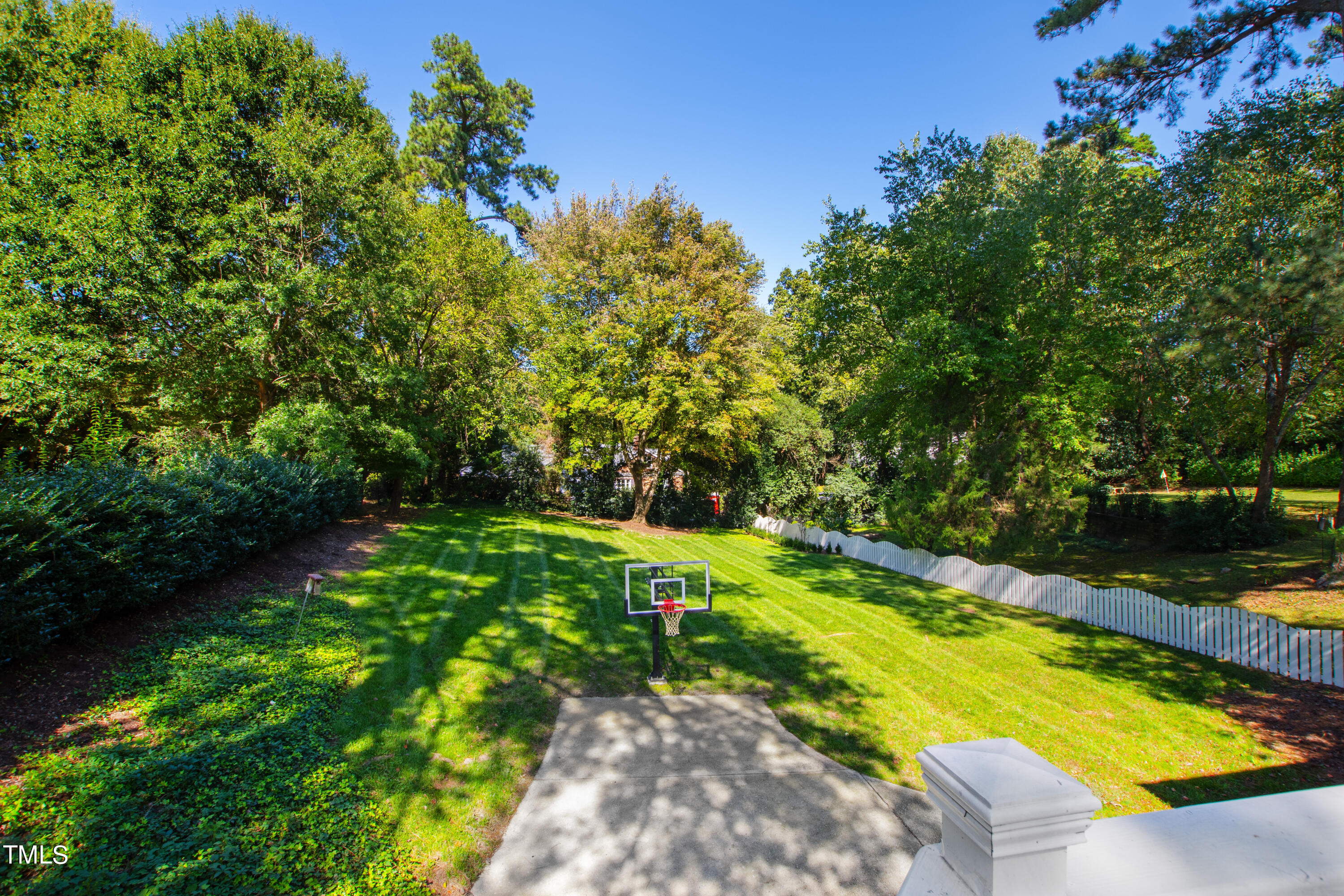 2618 Churchill Road Raleigh, NC 27608 - Photo 35 of 58 a view of a pathway with a yard