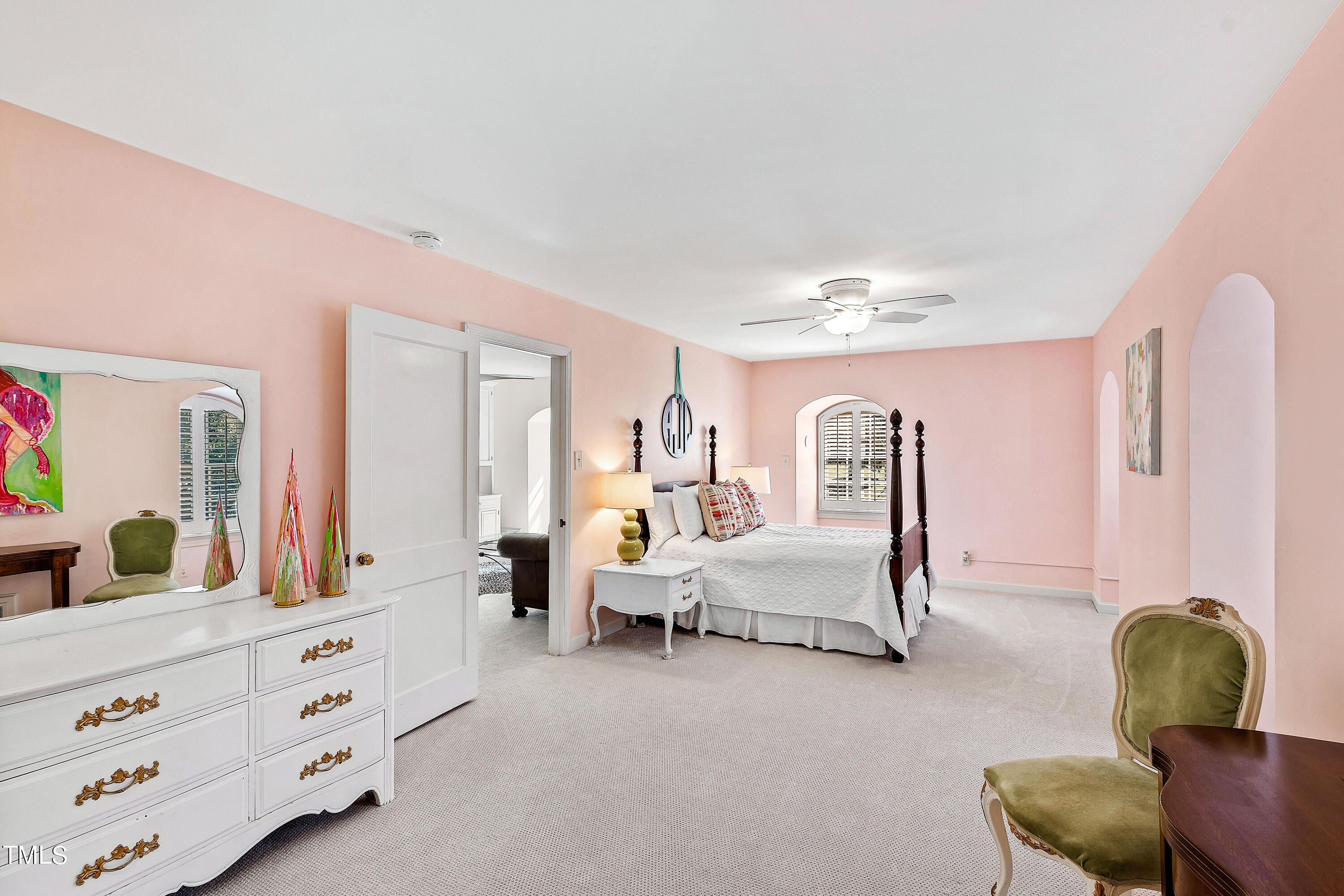 2618 Churchill Road Raleigh, NC 27608 - Photo 39 of 58 a bedroom with furniture and windows
