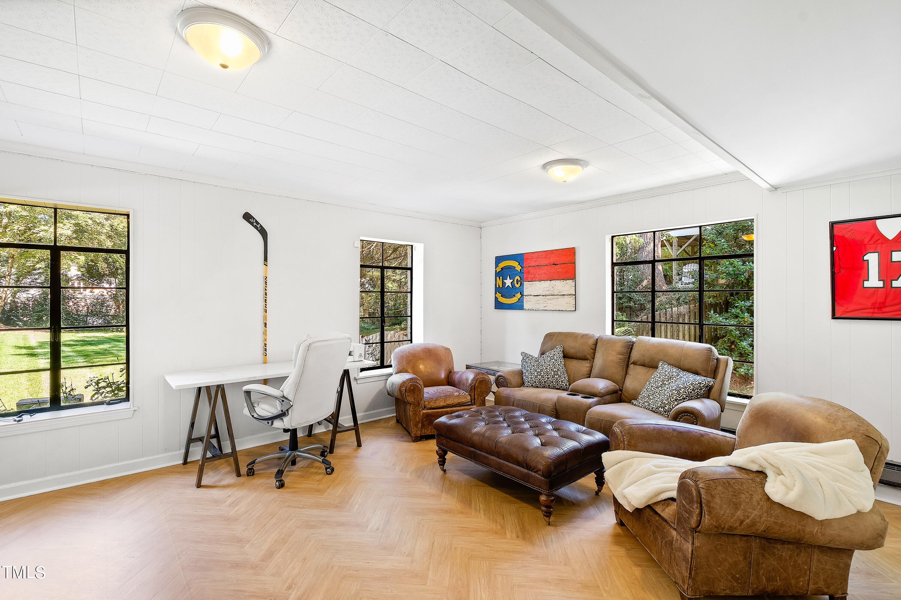 2618 Churchill Road Raleigh, NC 27608 - Photo 49 of 58 a living room with furniture and a window