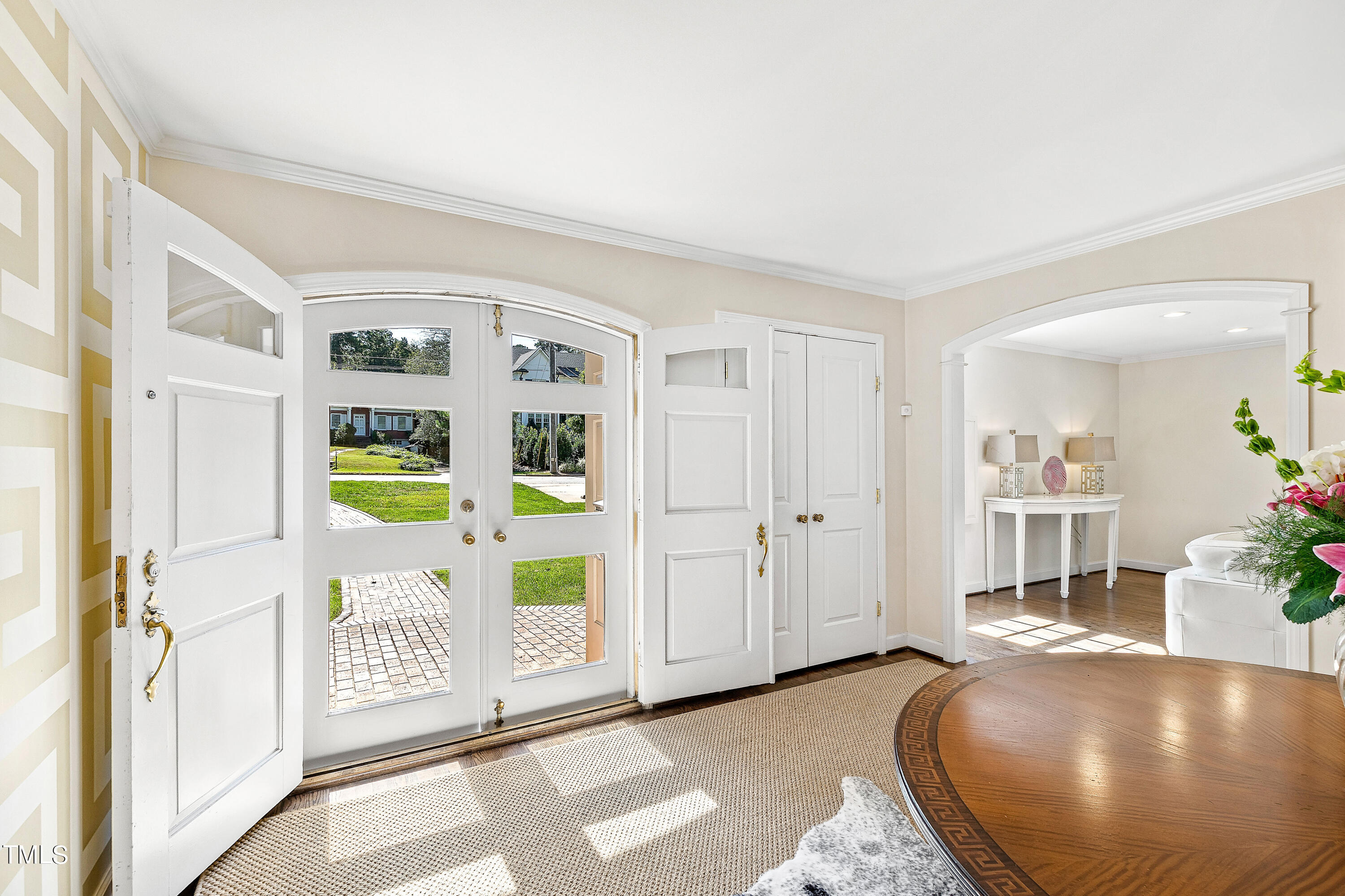 2618 Churchill Road Raleigh, NC 27608 - Photo 5 of 58 a view of an entryway with wooden floor