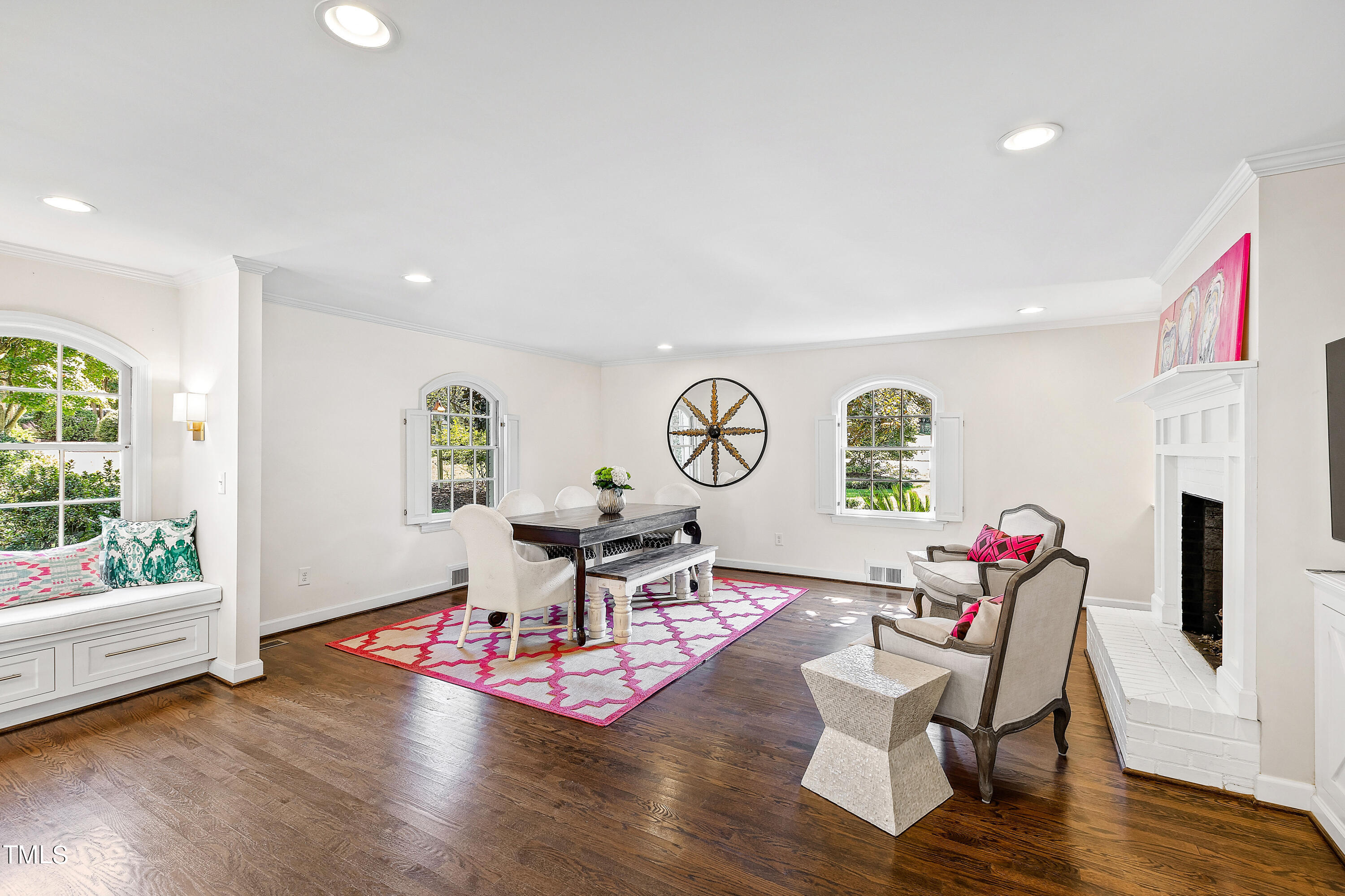 2618 Churchill Road Raleigh, NC 27608 - Photo 10 of 58 a living room with furniture and a wooden floor