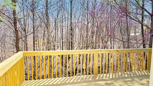 a kitchen with stainless steel appliances white cabinets and a sink
