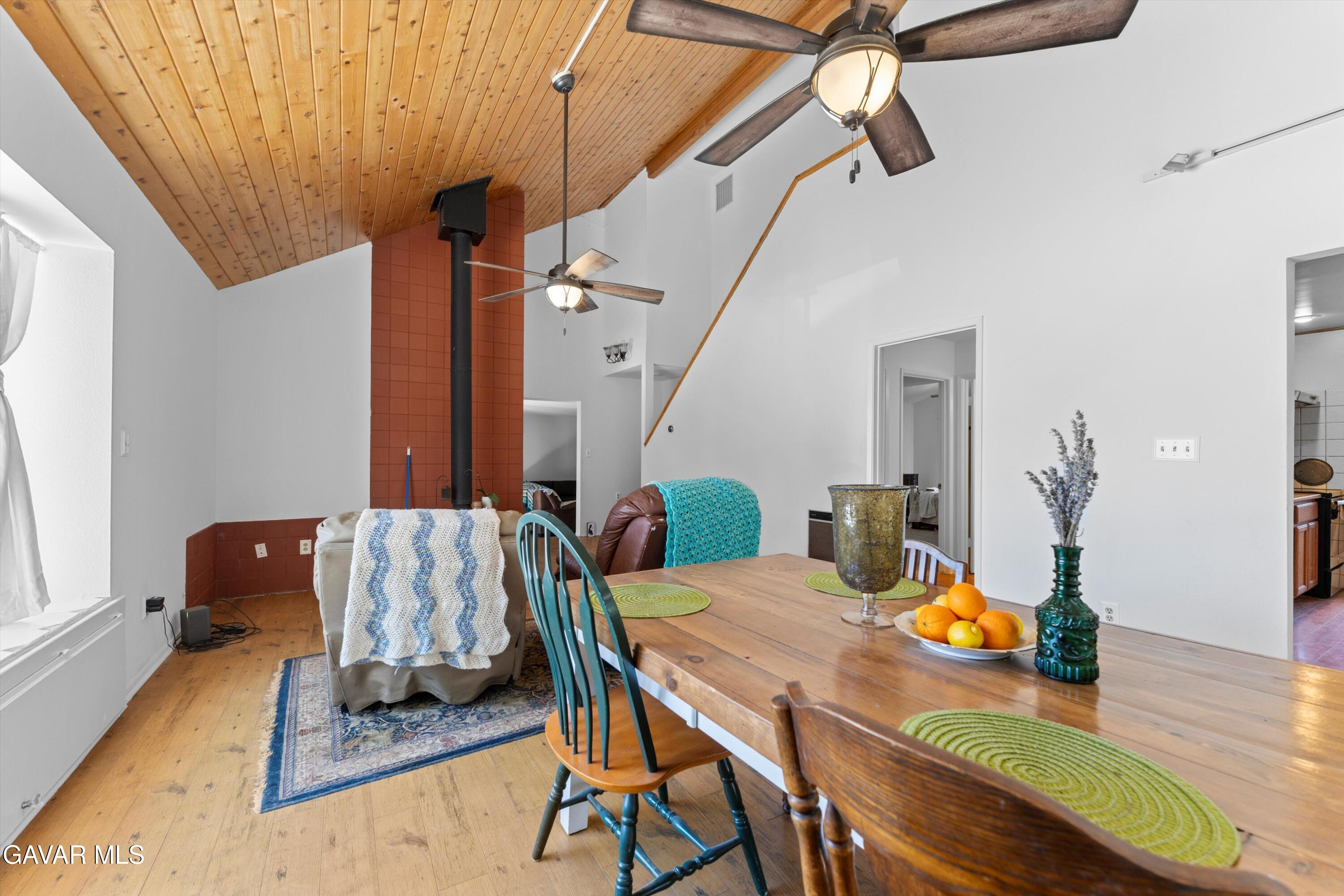 24750 Flatiron Court Tehachapi, CA 93561 - Photo 5 of 25 a view of a dining room with furniture and wooden floor