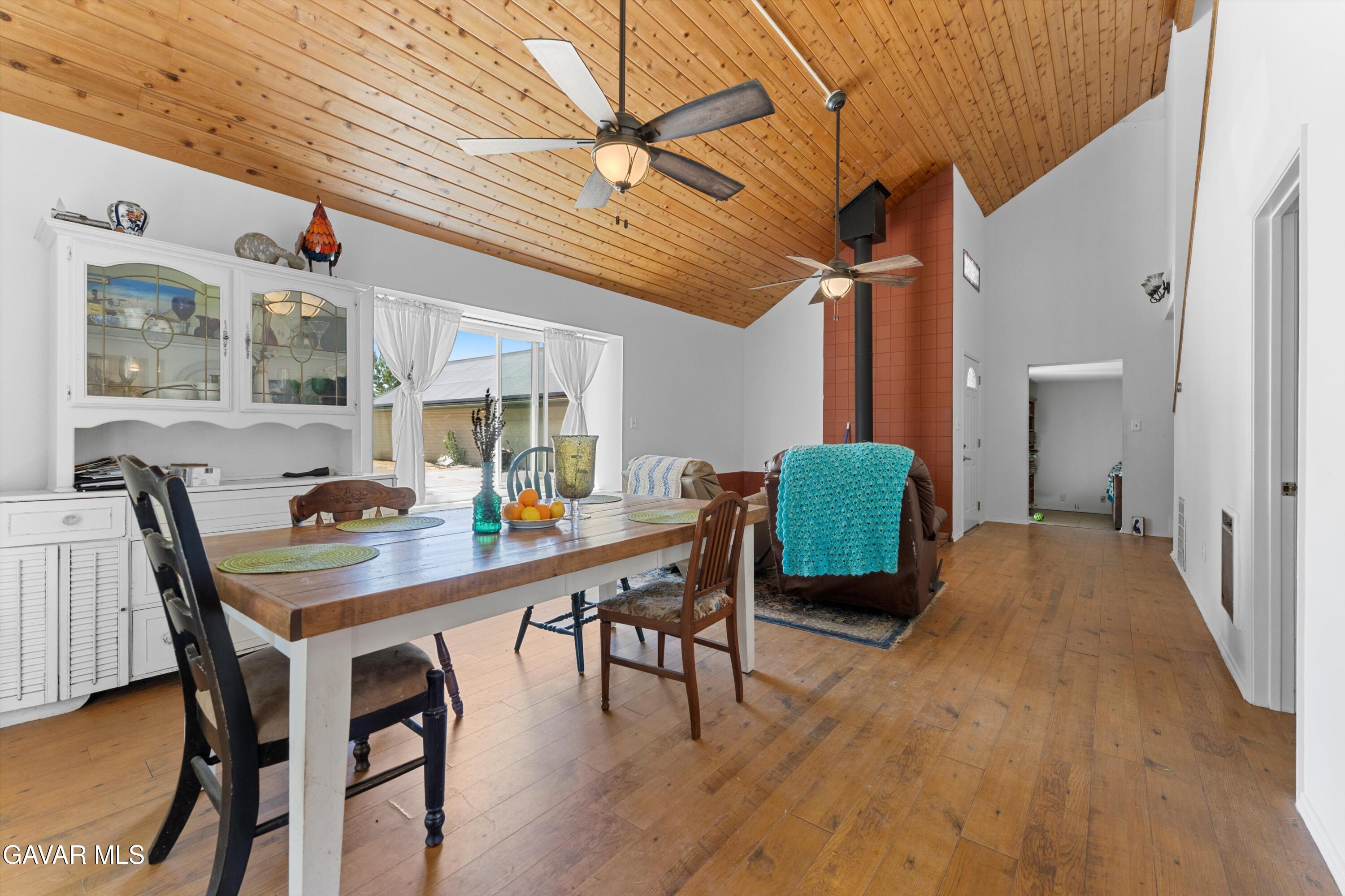 24750 Flatiron Court Tehachapi, CA 93561 - Photo 6 of 25 a dining room with furniture and wooden floor