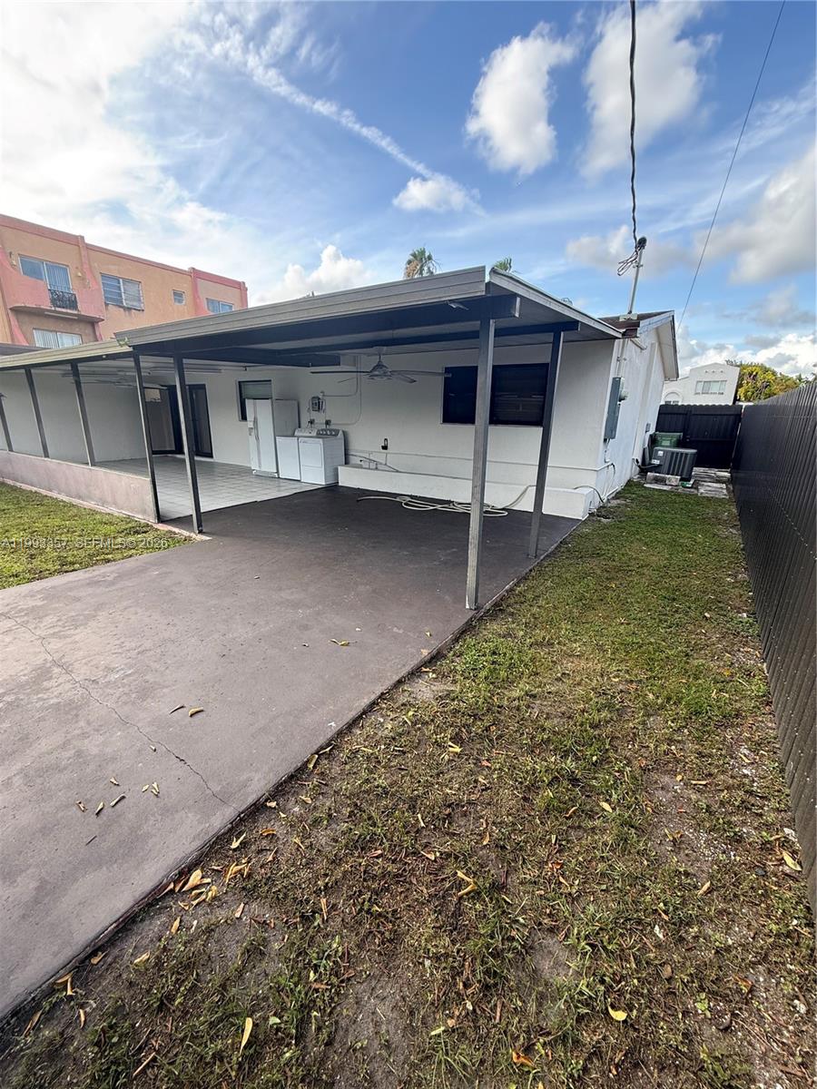 1050 West 37th Street Hialeah, FL 33012 - Photo 16 of 19 a view of a house with a balcony