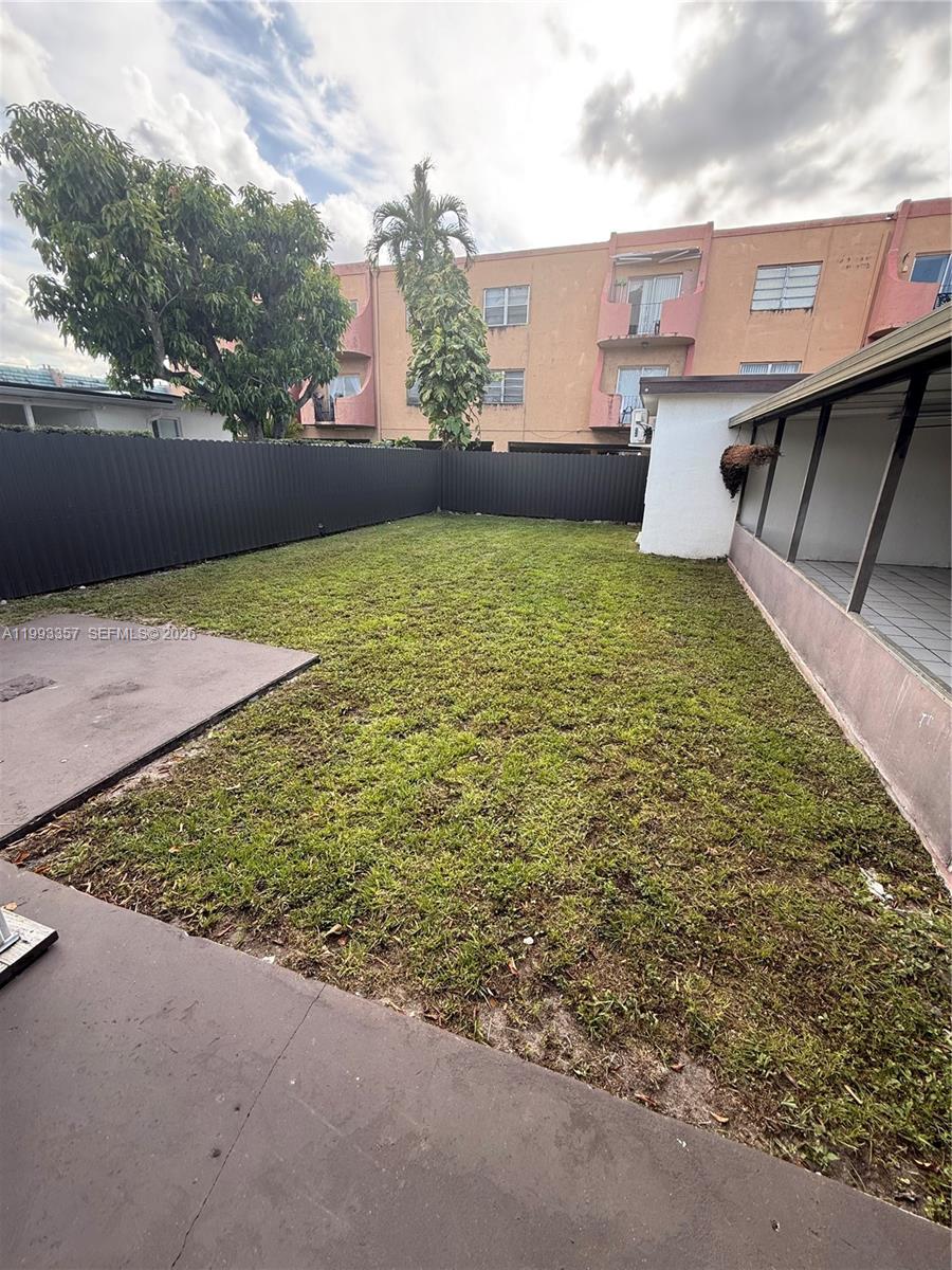 1050 West 37th Street Hialeah, FL 33012 - Photo 17 of 19 a view of a backyard