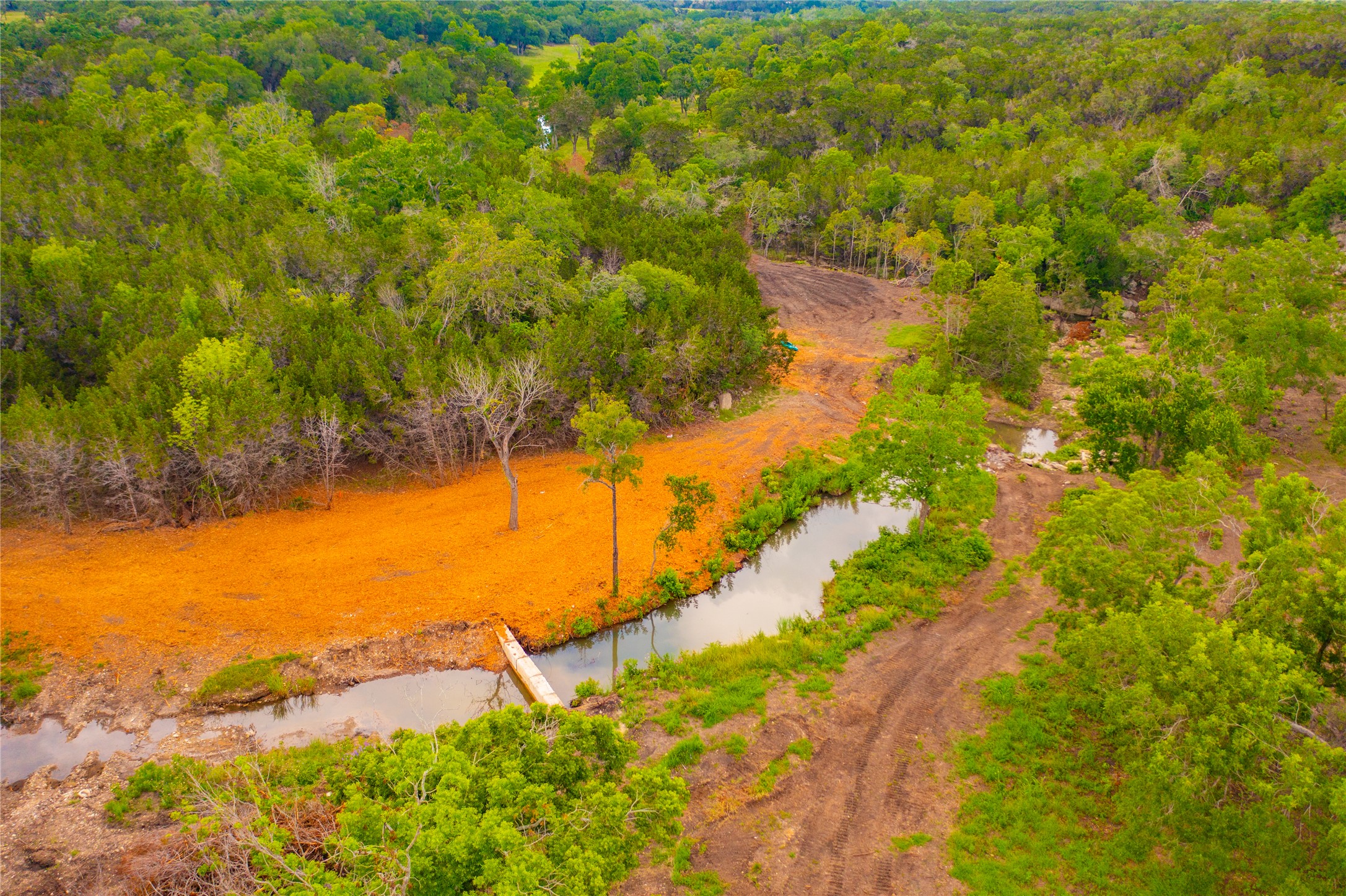 0 Spring Creek Ranch Wimberley, TX 78676 - Photo 29 of 29 a view of a lake with a yard